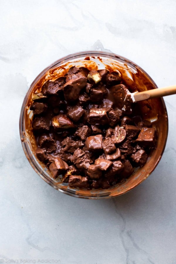 bread cubes and chocolate custard sauce in a glass bowl