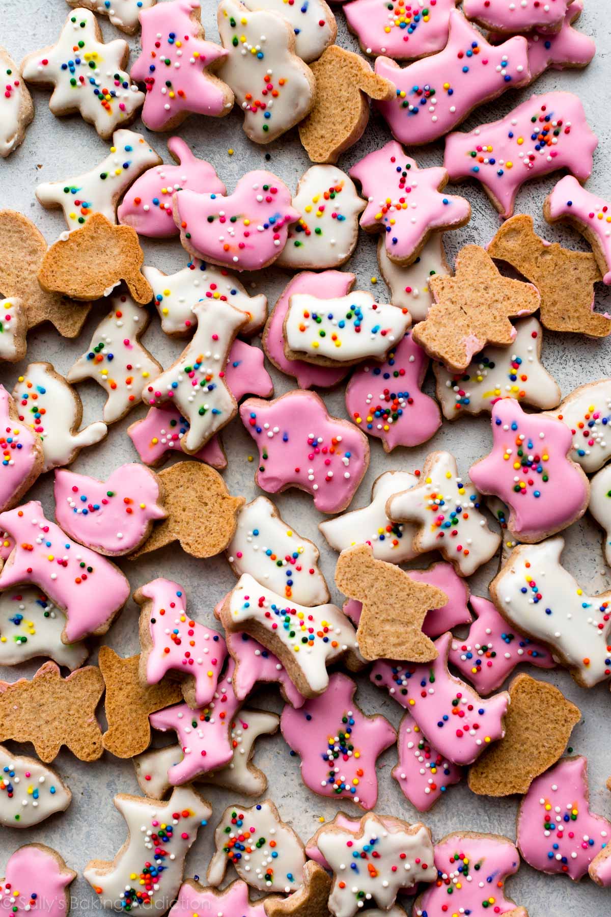 animal cracker cookies with pink and white icing