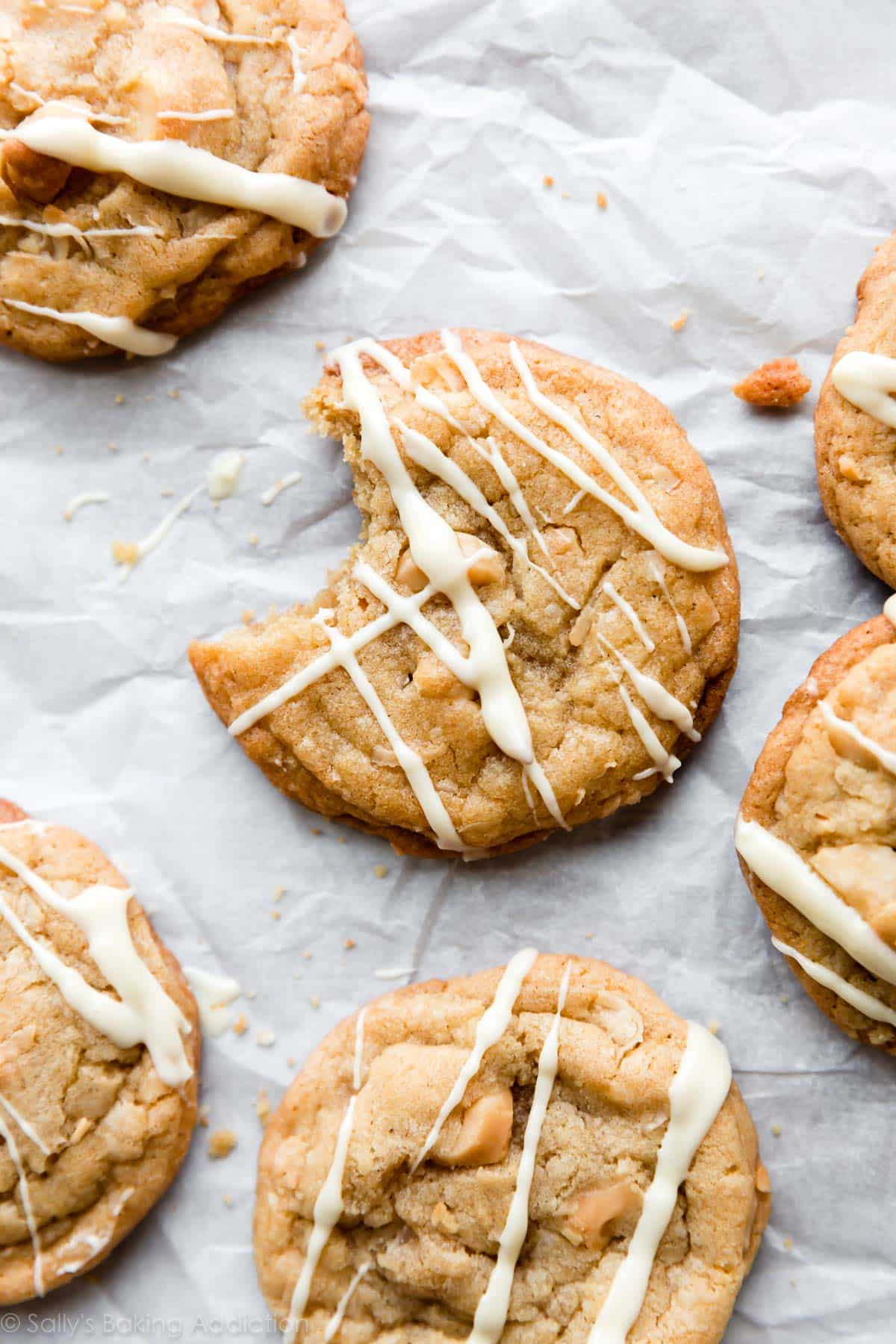 coconut macadamia nut cookies with white chocolate drizzle