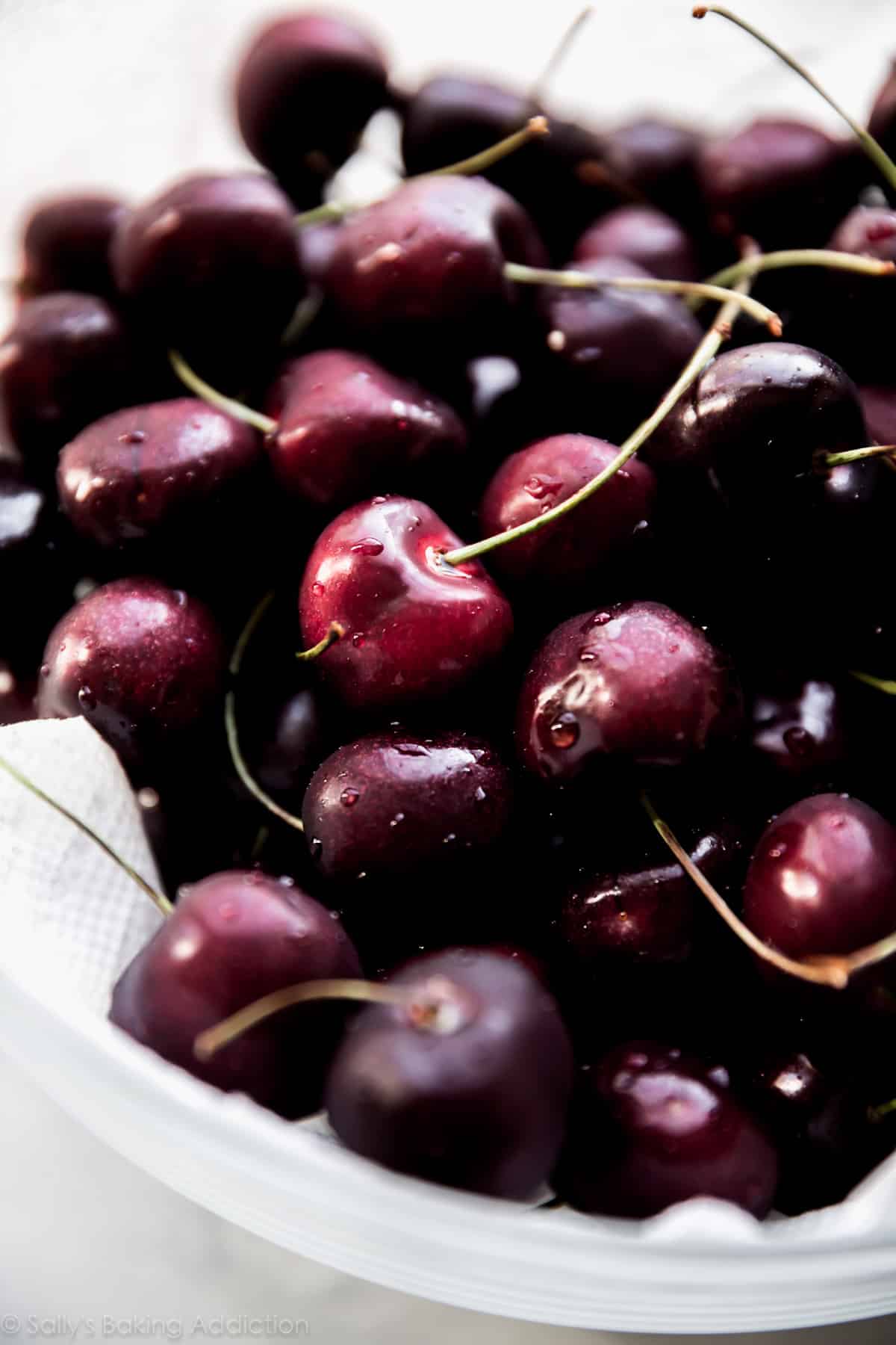 fresh cherries in a glass bowl
