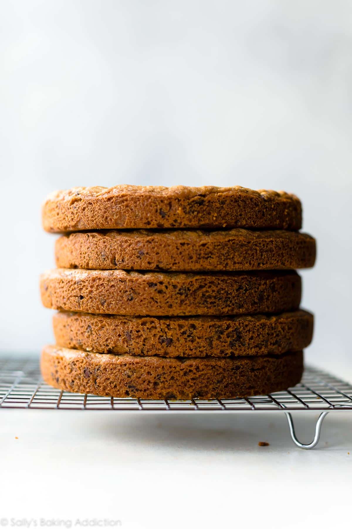 stack of 5 layers of chocolate chip cookie cake