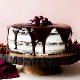 Black Forest Cake on a wood slice cake stand