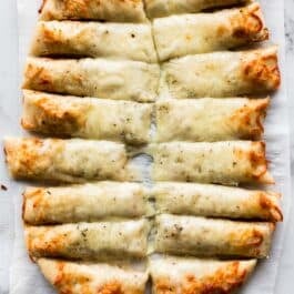 Homemade cheesy breadsticks with garlic