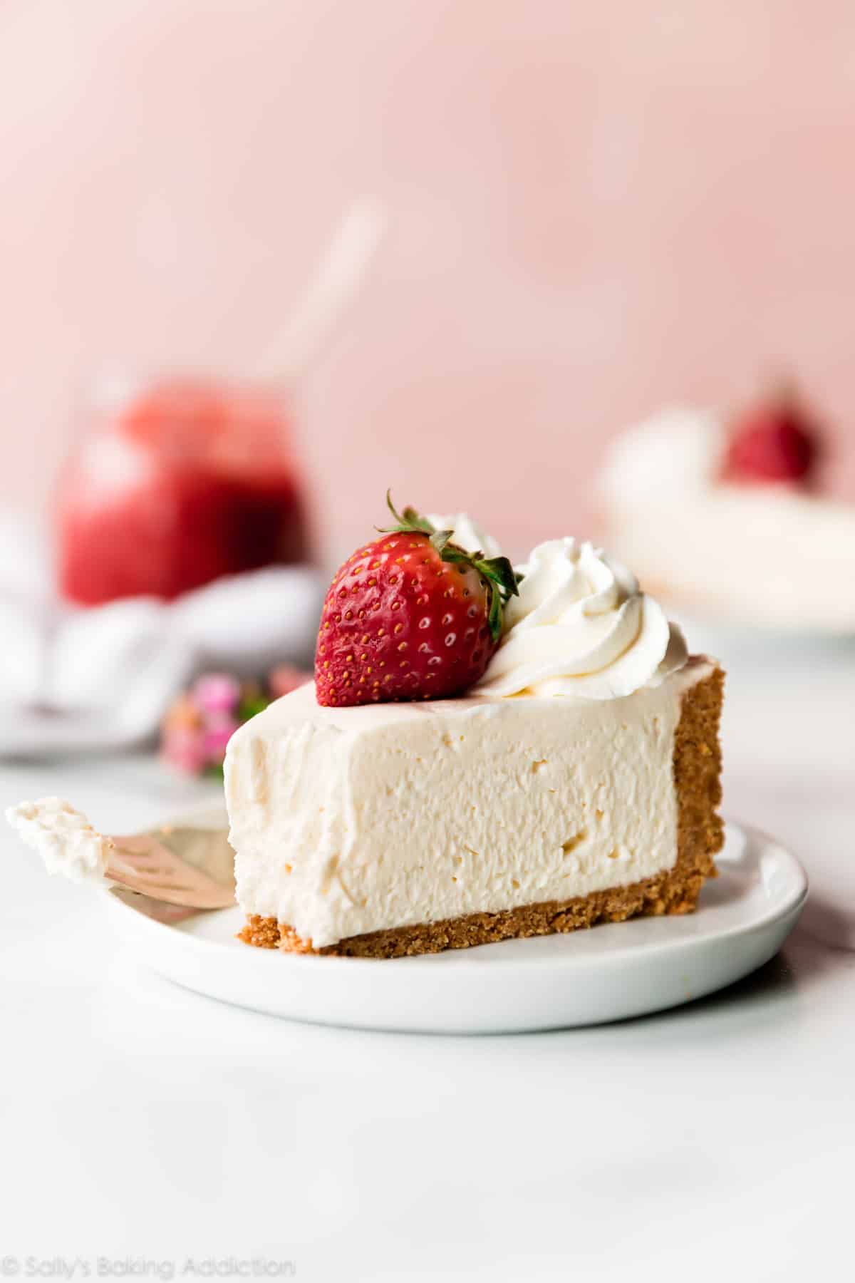 Slice of no bake cheesecake on white plate
