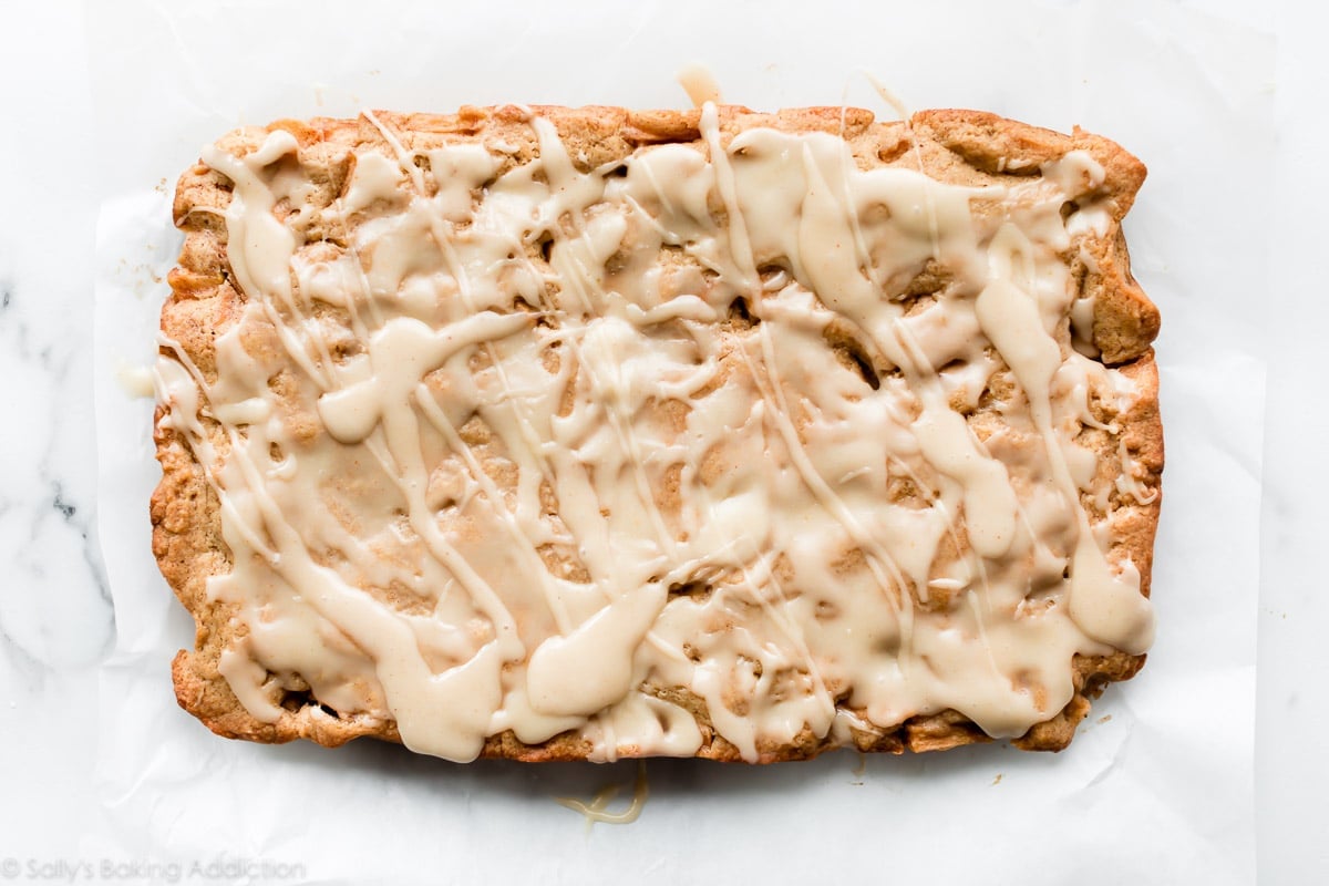 apple blondies with brown butter icing removed from baking pan