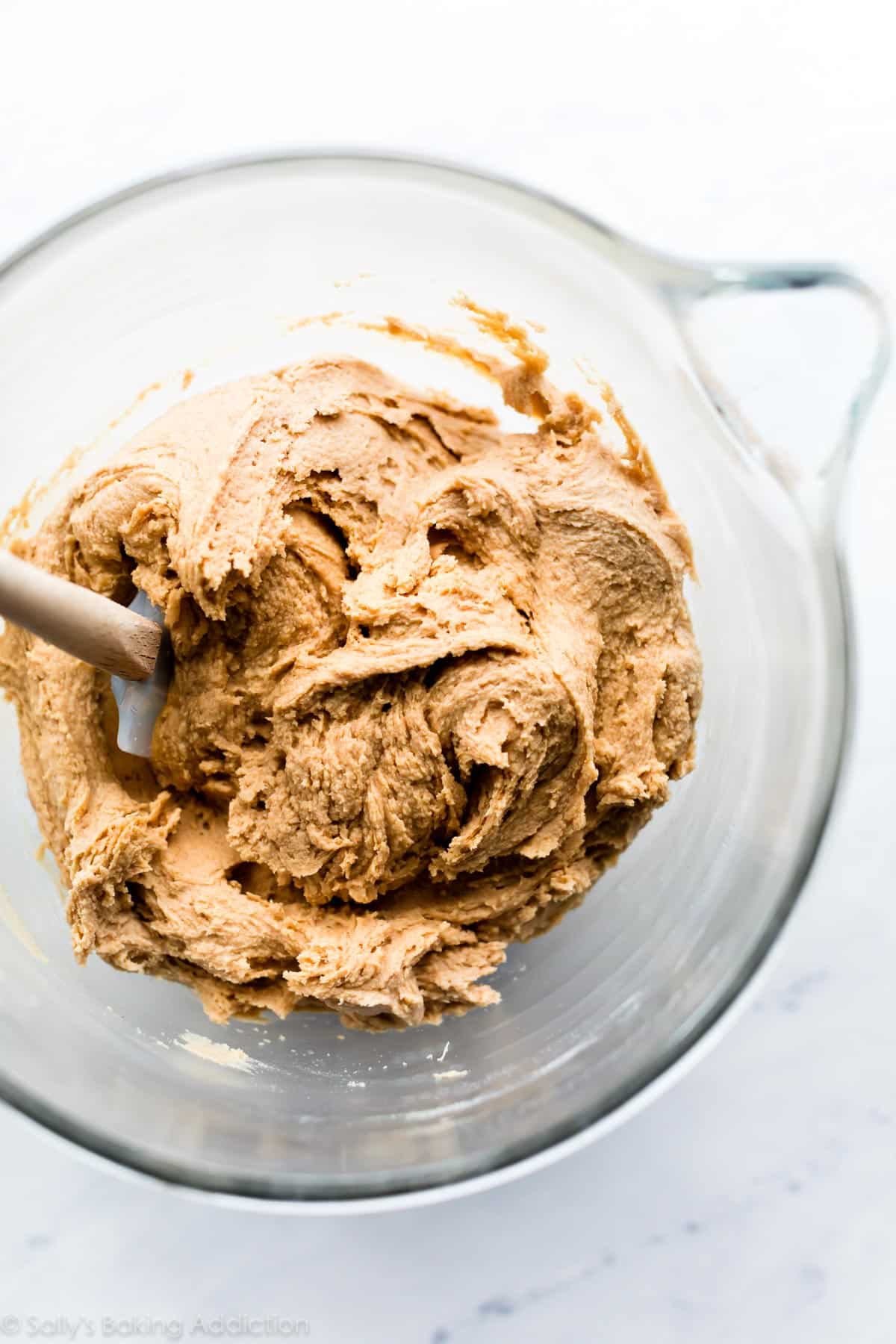 peanut butter cookie dough in a glass bowl