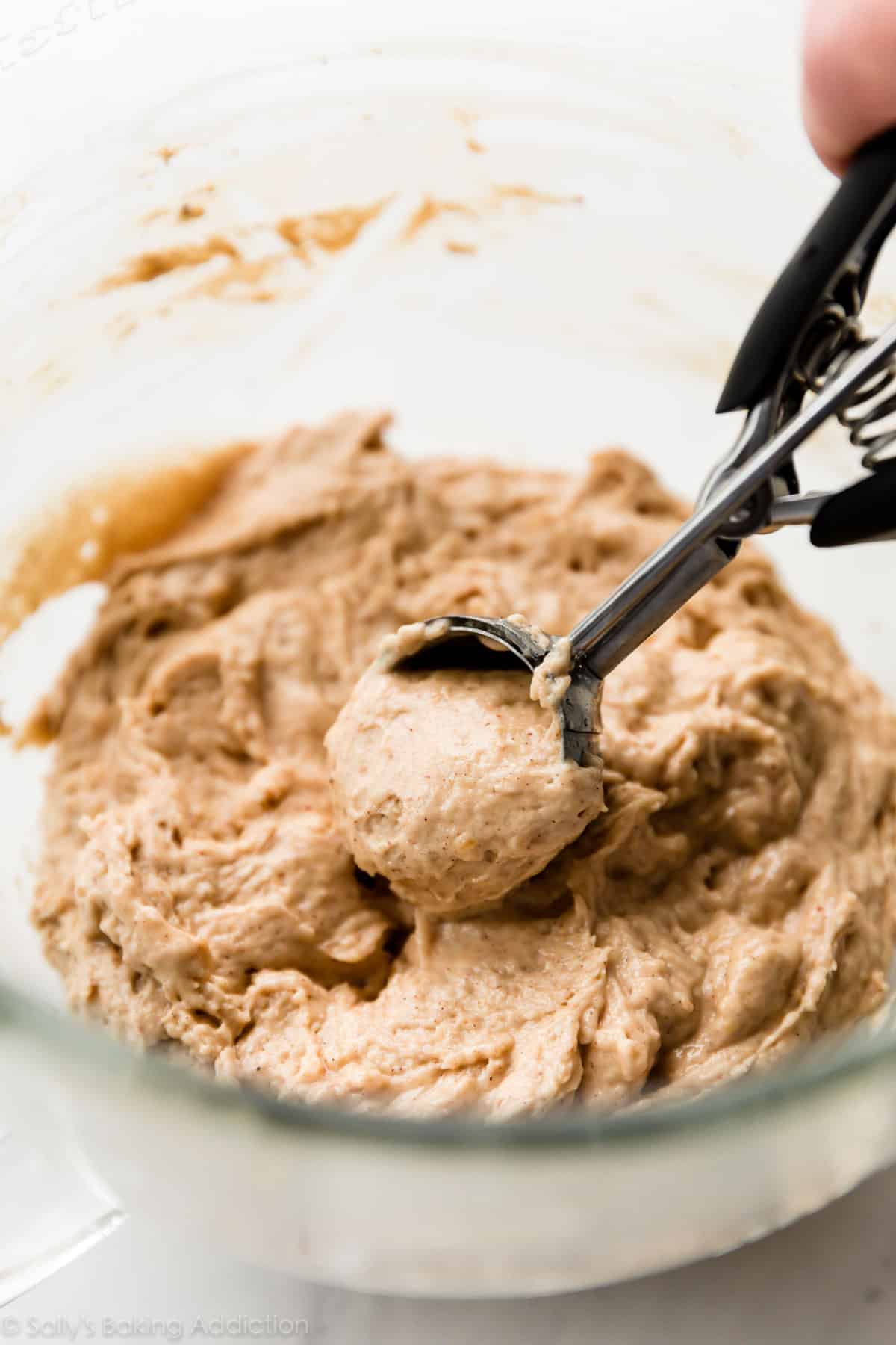 apple cinnamon spice whoopie pie batter with a cookie scoop