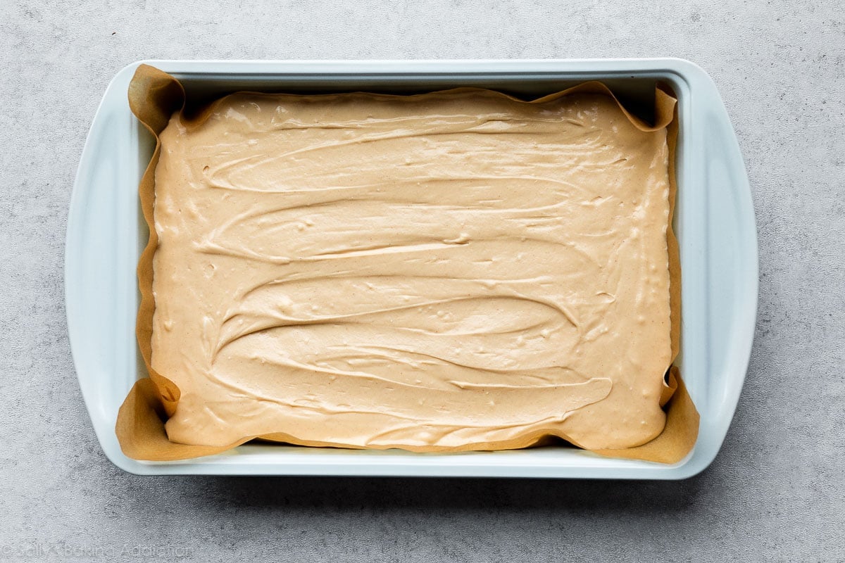 peanut butter cheesecake batter in baking pan