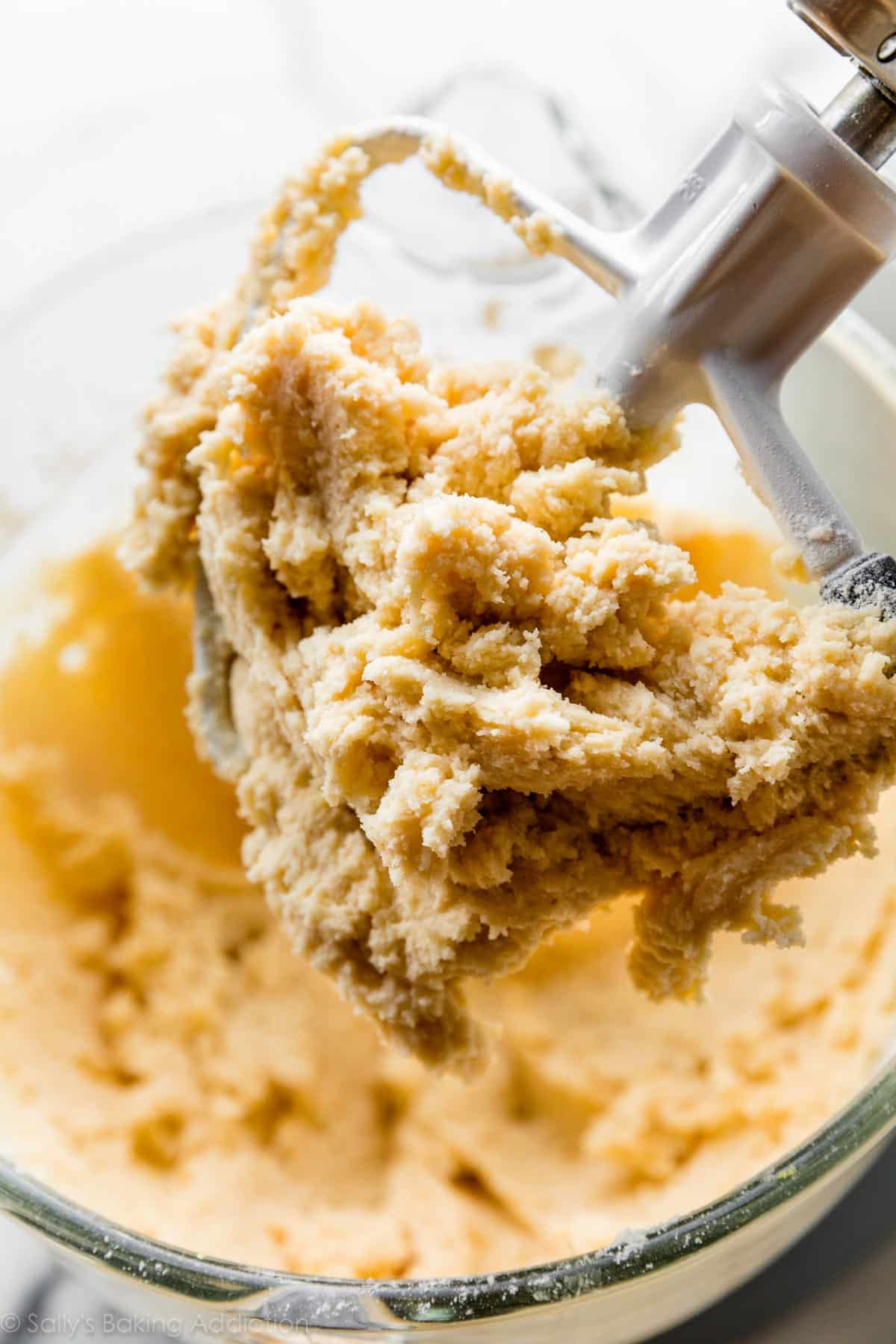 cream cheese cookie dough shown on flat paddle mixer attachment