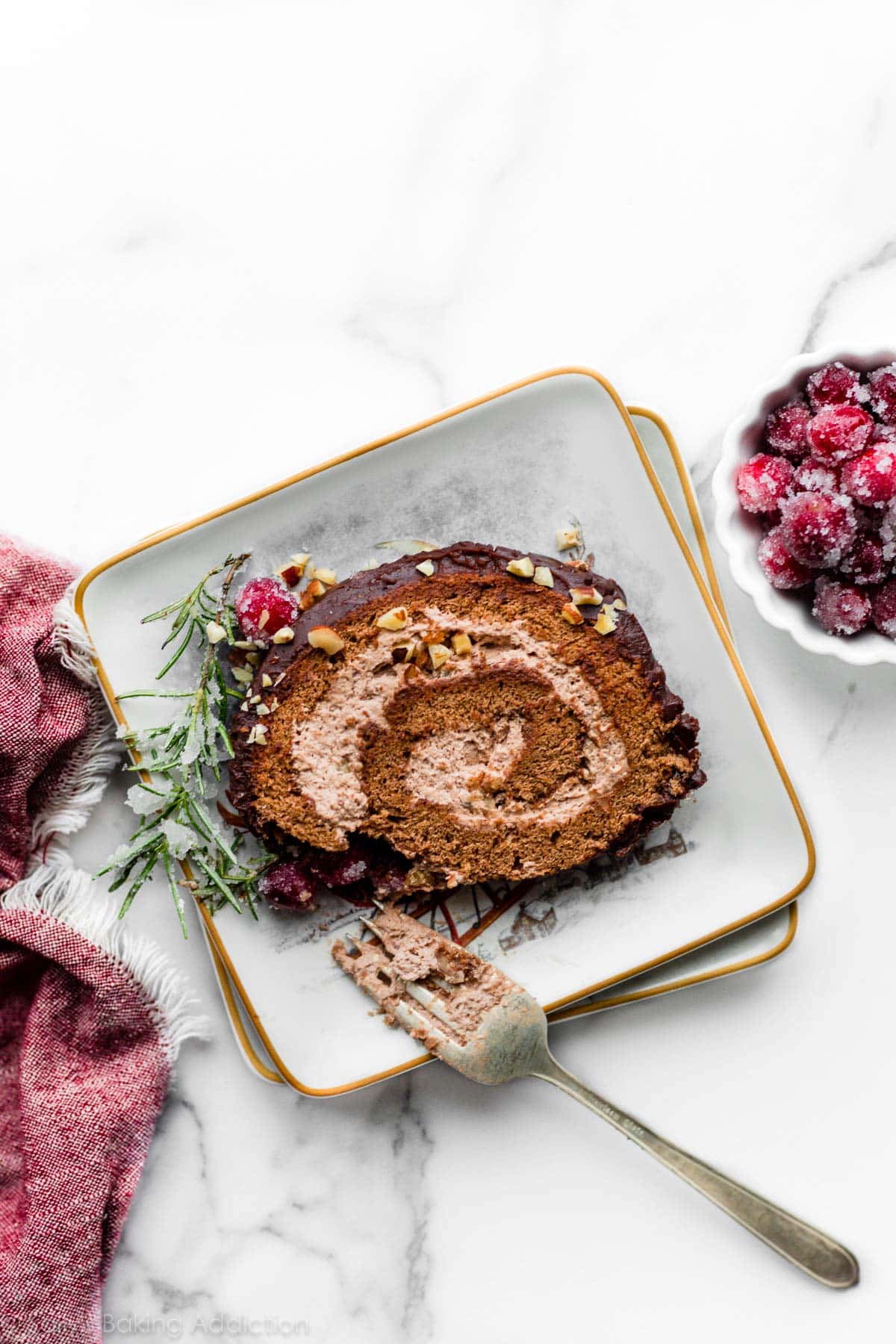 slice of yule log cake on plate