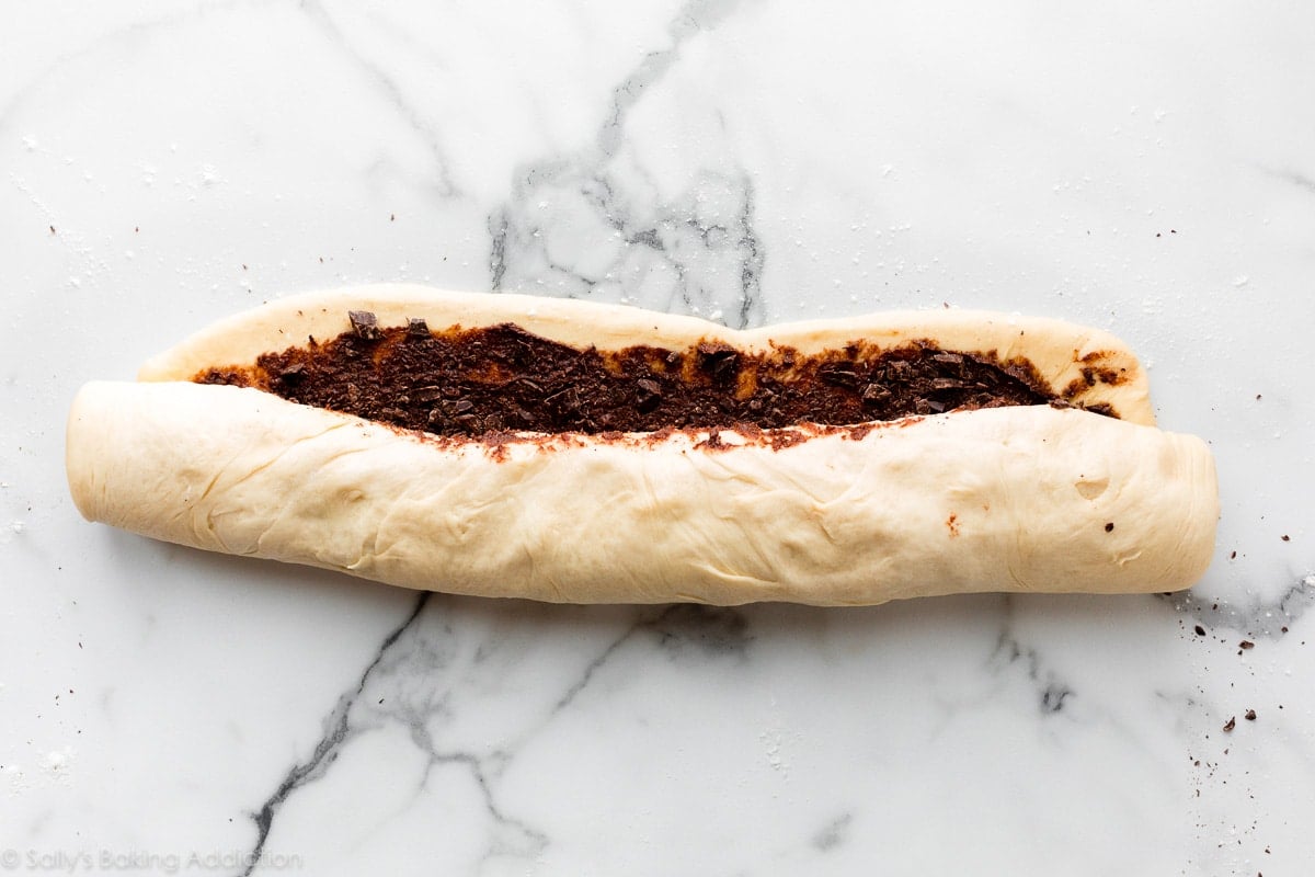 rolling up the chocolate rolls dough