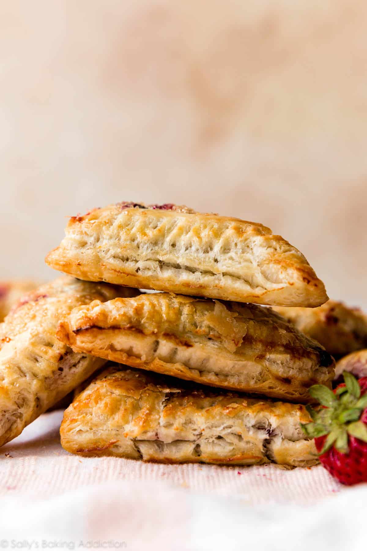 stack of 3 turnovers made with homemade puff pastry dough