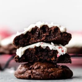 thick peppermint chocolate cookies broken in half and stacked