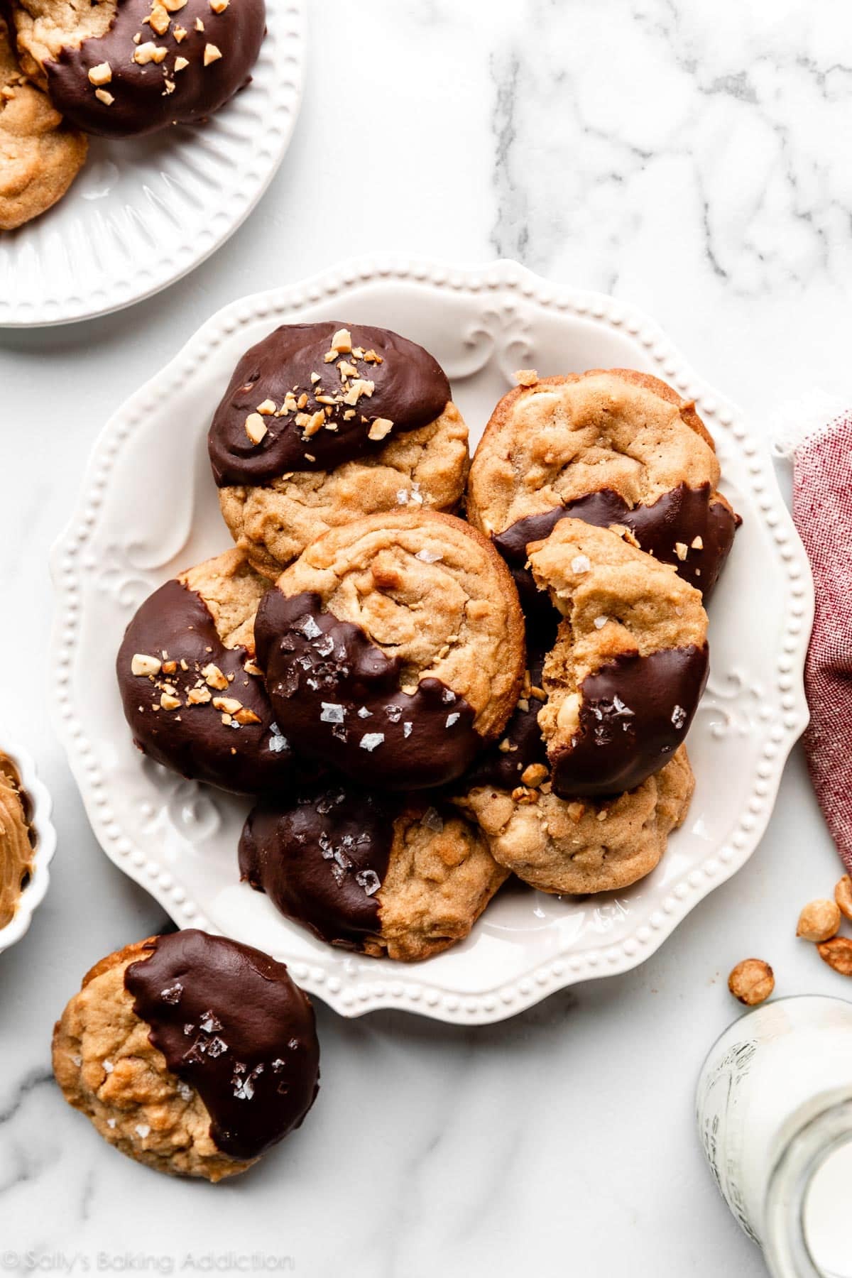 peanut butter chocolate half moon cookies on white plate