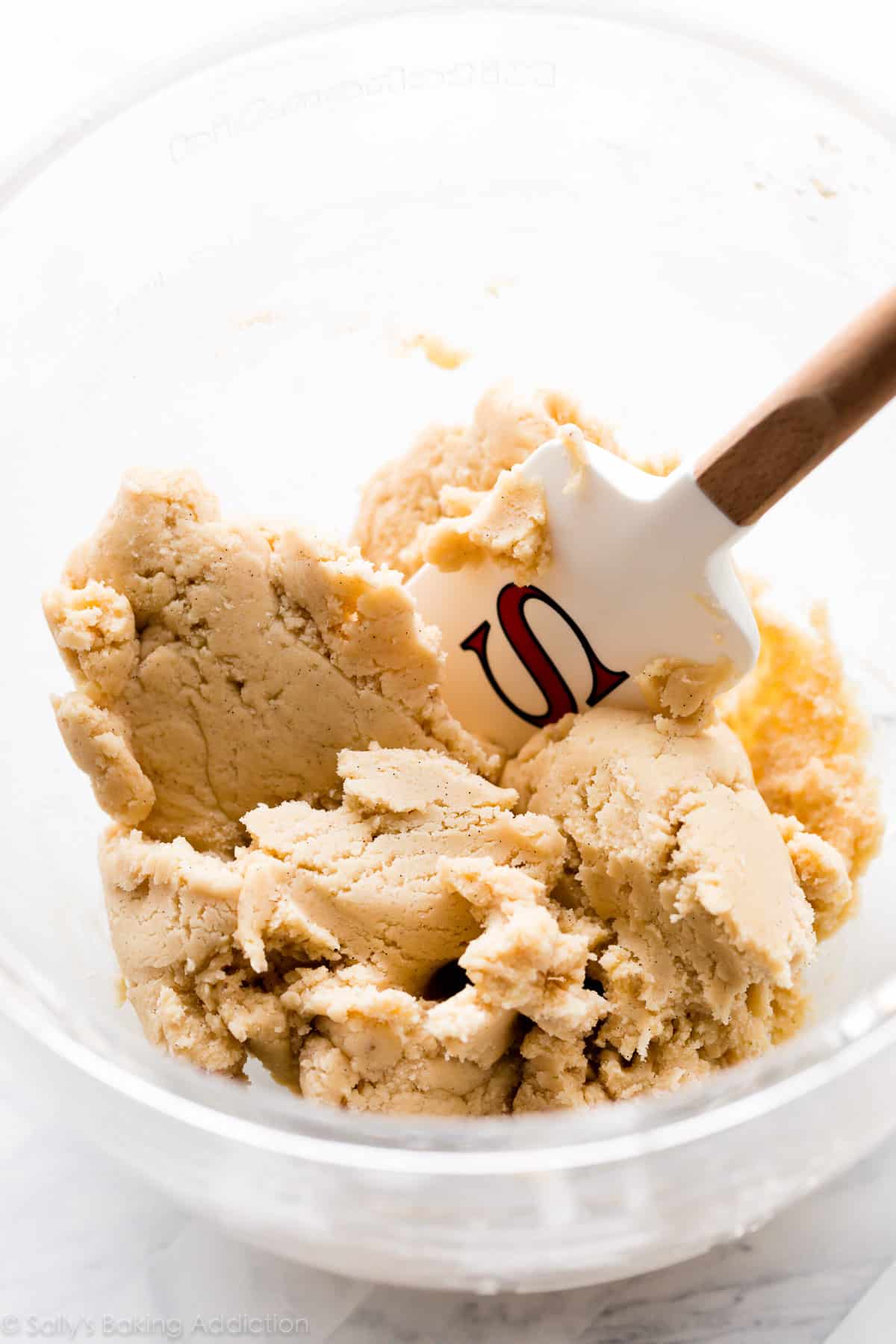 vanilla bean sugar cookie dough in glass mixing bowl