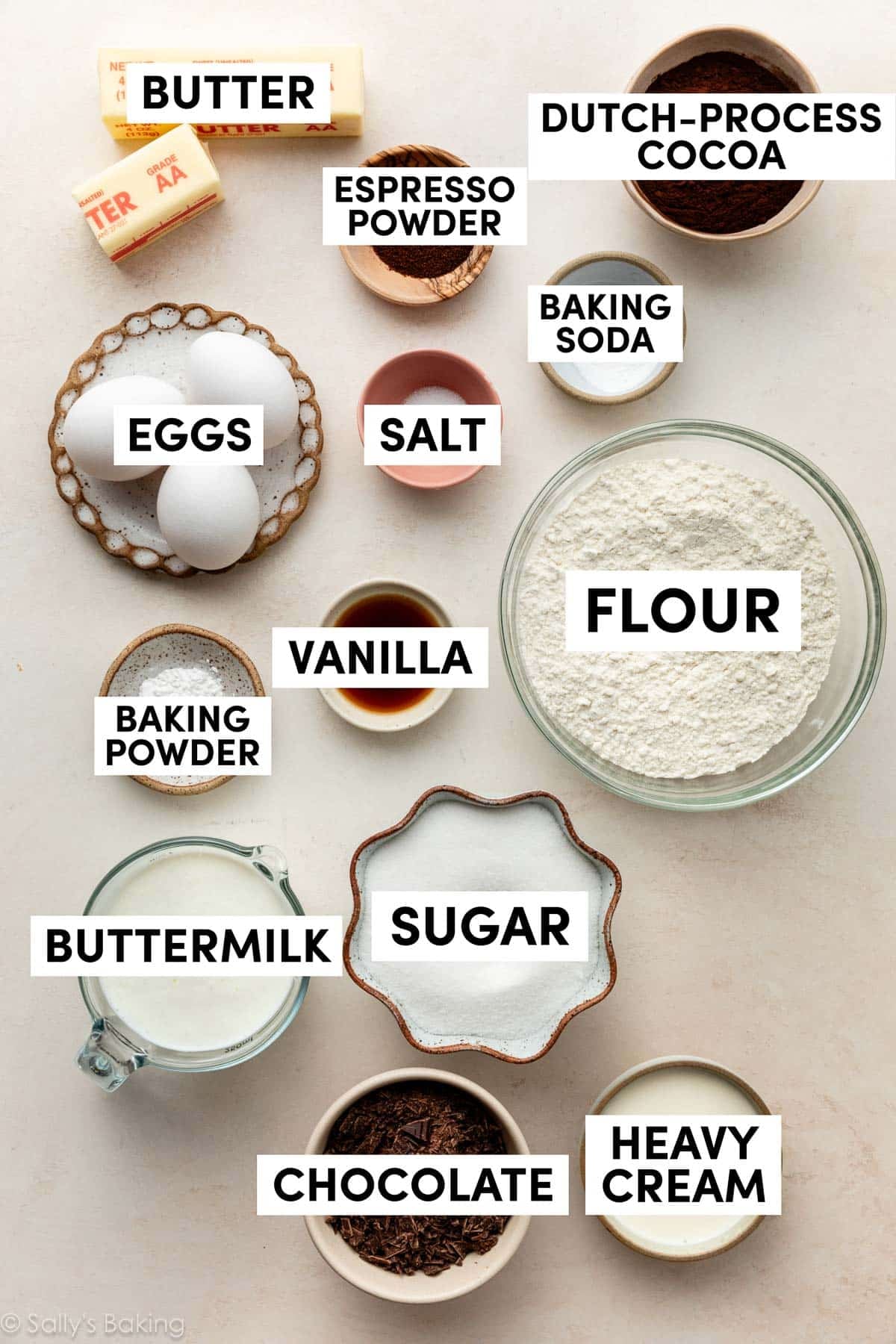 ingredients measured out in bowls and plates on ivory surface.