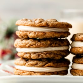 stack of 3 eggnog oatmeal cream pie cookies.