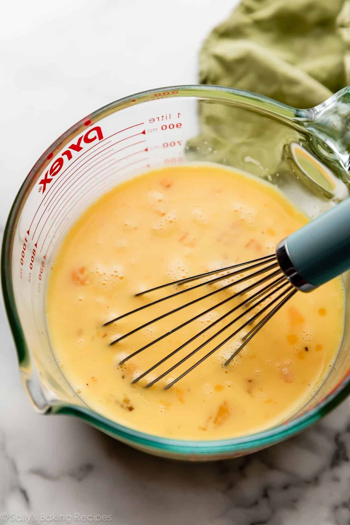 beaten eggs in large liquid measuring cup.