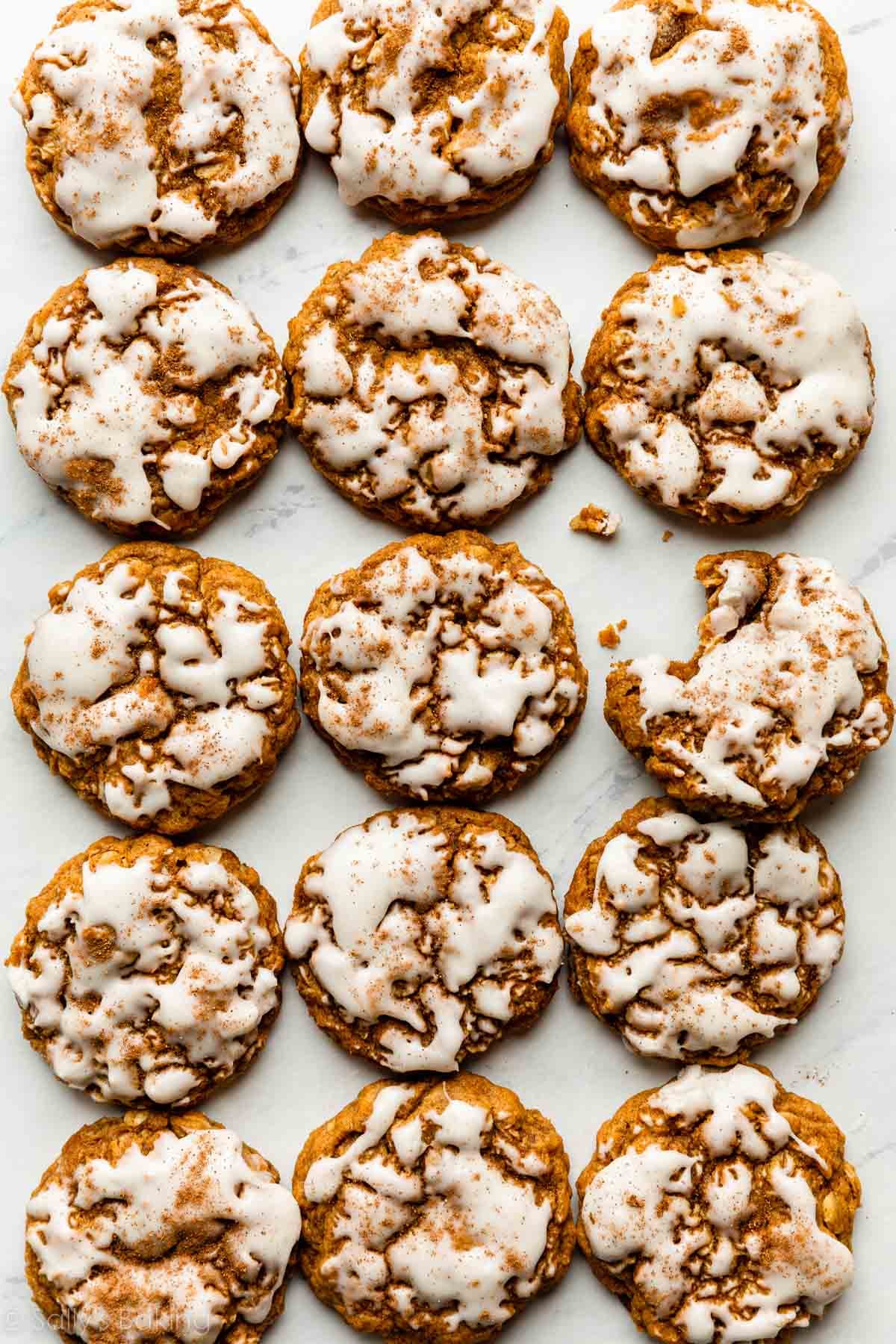 pumpkin oatmeal cookies with brown butter icing on top.