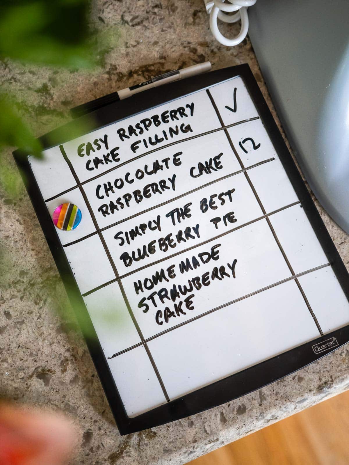 list of recipes on white board.