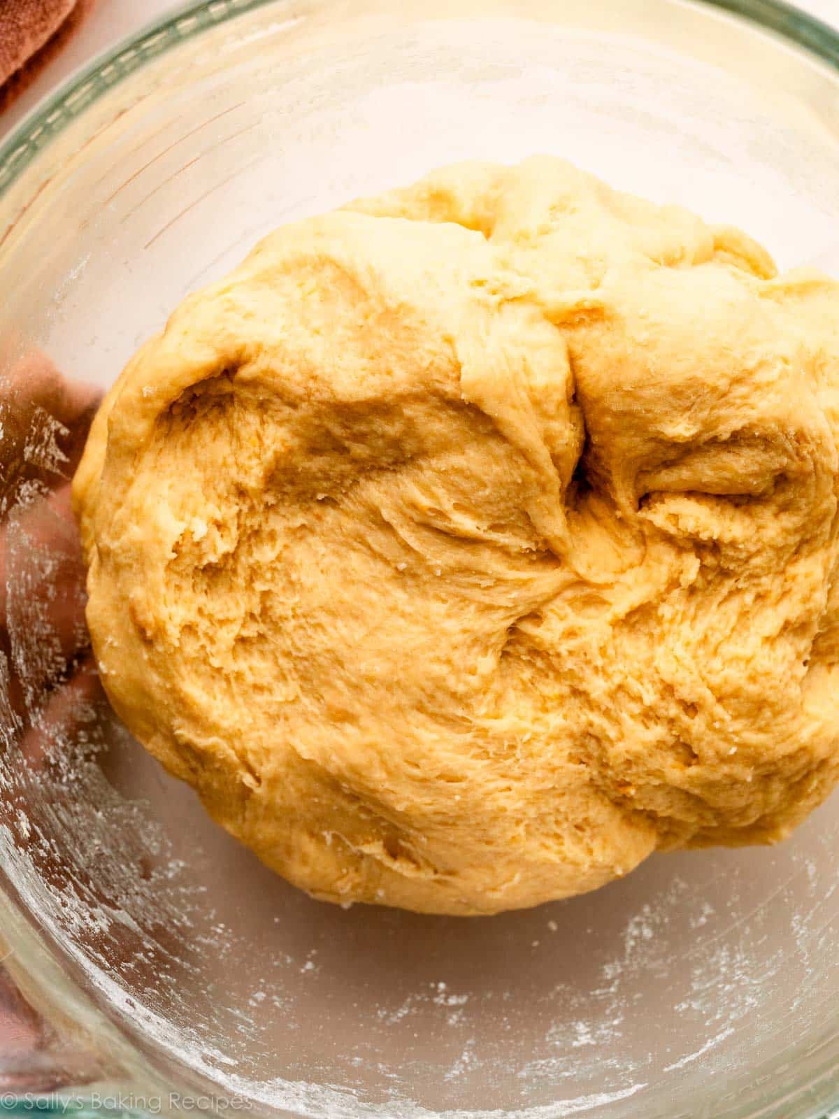 orange-colored dough in bowl.