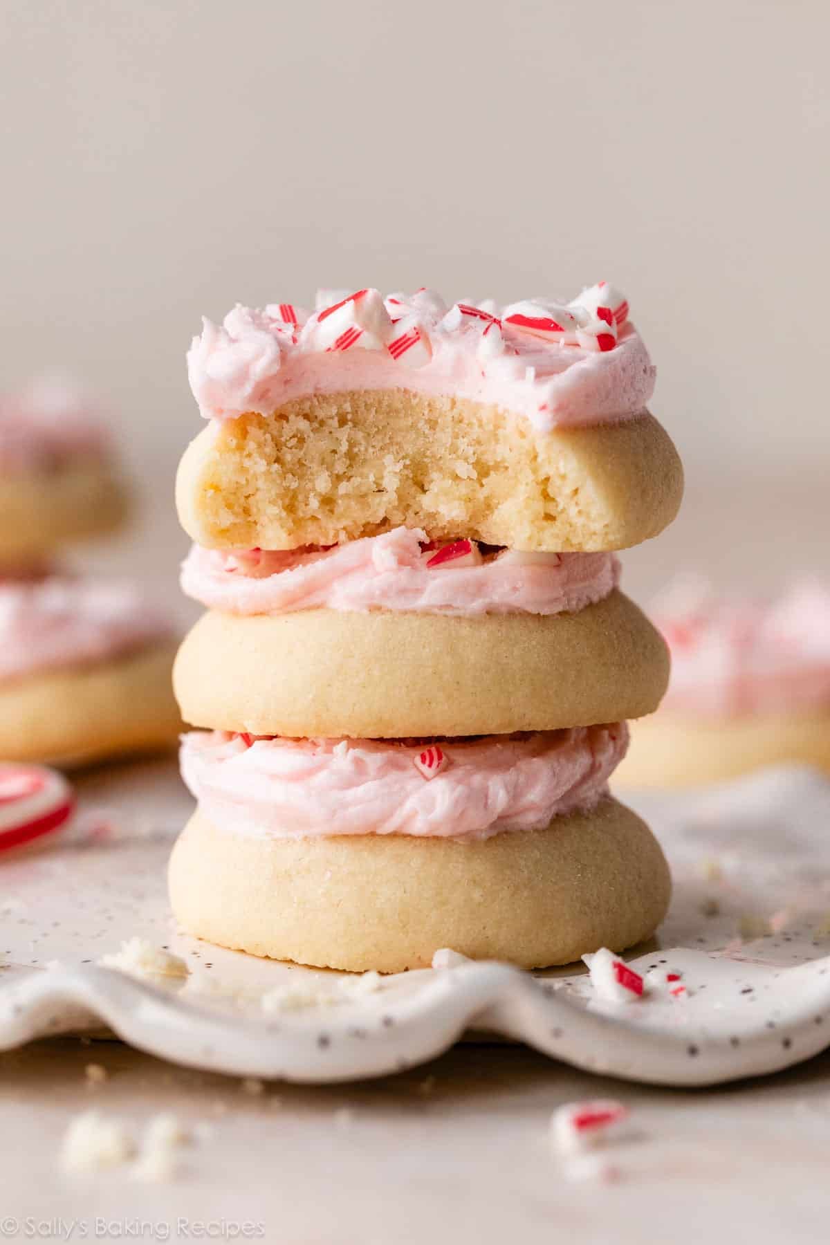 stack of 3 frosted peppermint meltaway cookies.