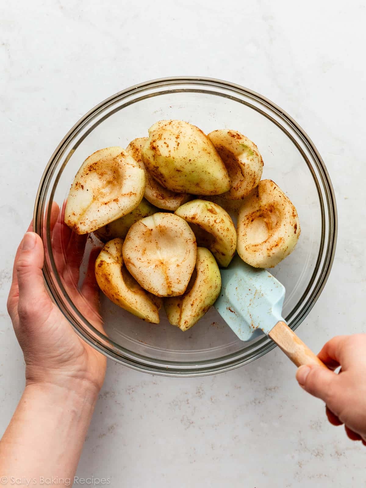 pear halves in glass bowl.