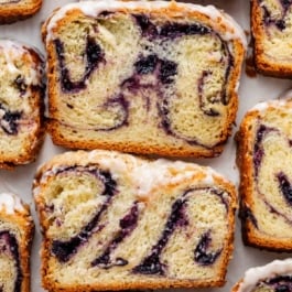 slices of lemon blueberry babka with icing.