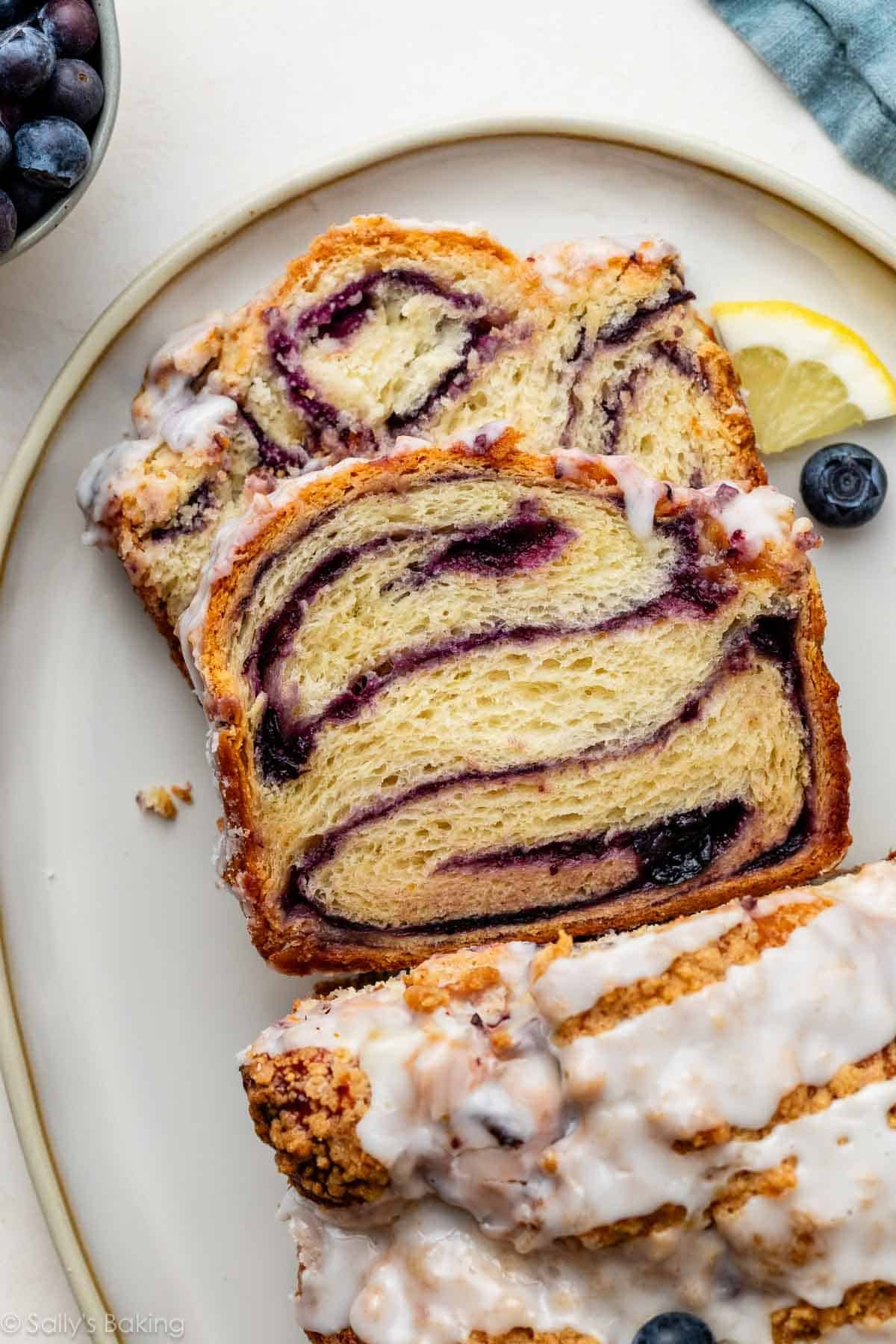 lemon blueberry babka sliced on serving platter.