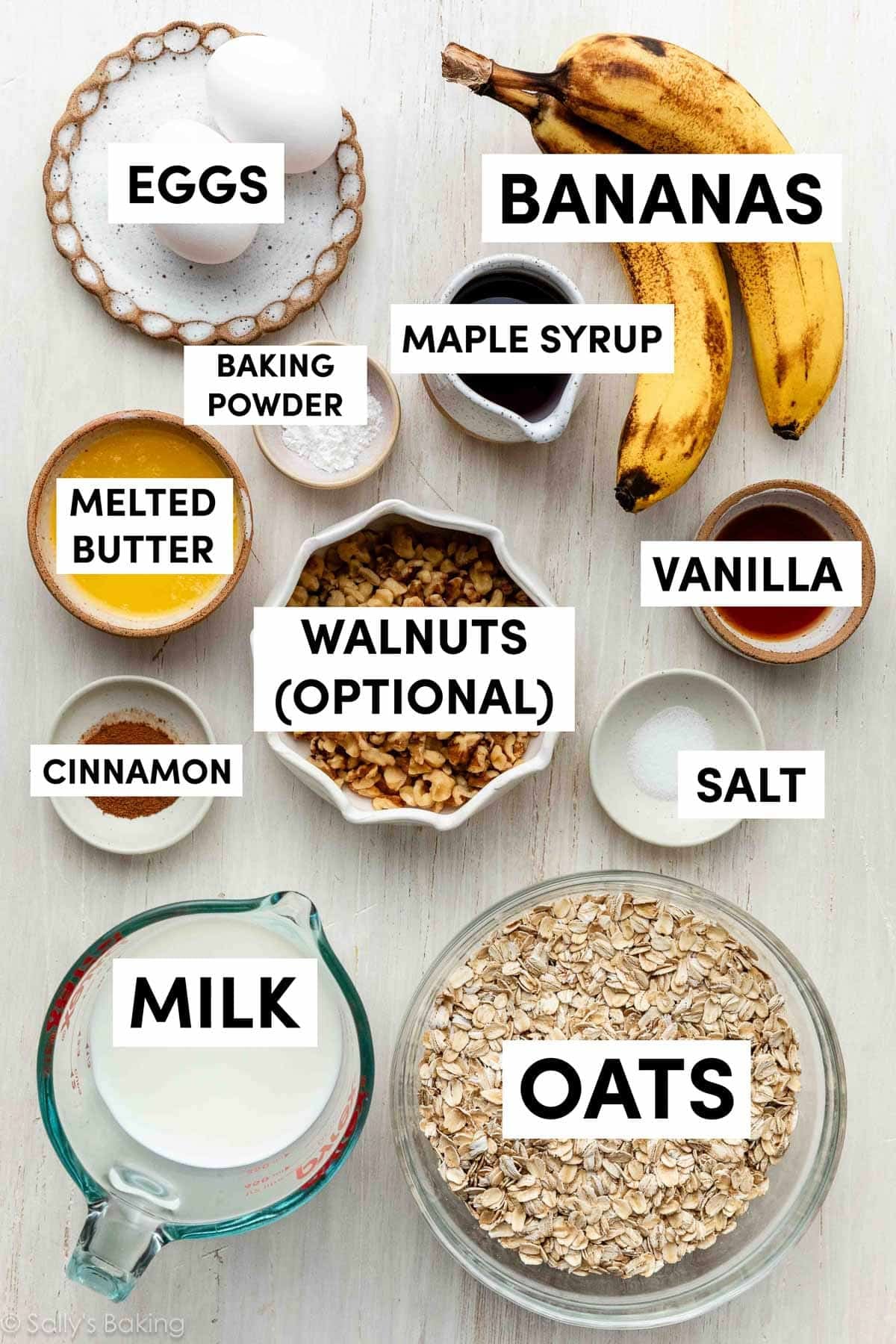 ingredients in bowls including oats, melted butter, eggs, milk, walnuts, and maple syrup.