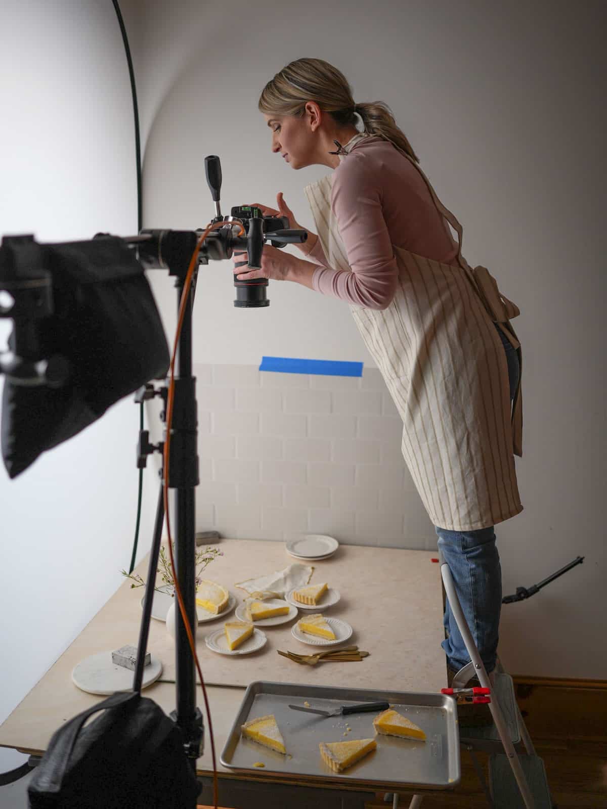 Sally taking photo of lemon tart.