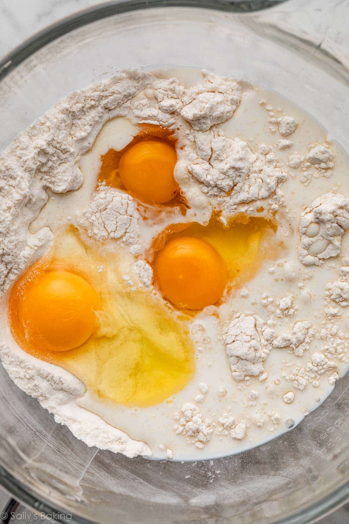 eggs in bowl of flour.