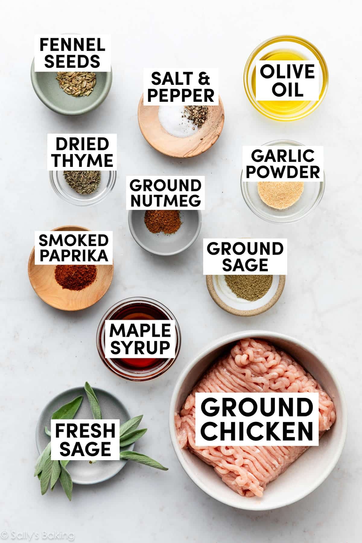 small bowls of herbs and ingredients, plus a bowl of ground chicken.