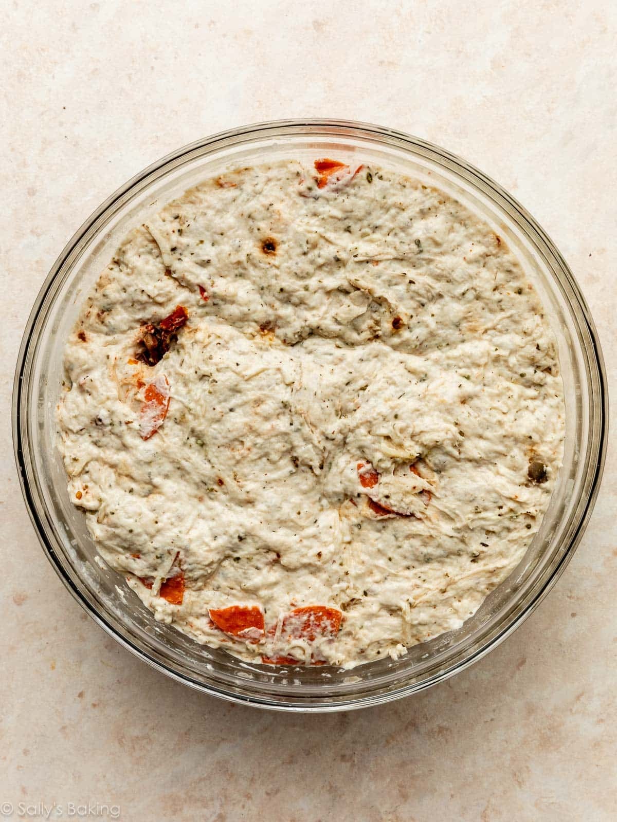 dough risen in bowl.