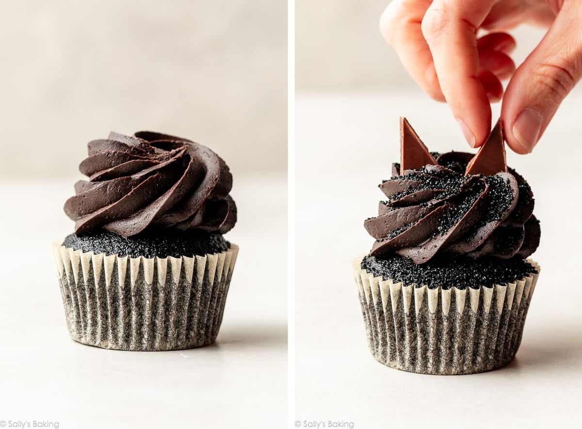 piped black frosting on cupcake and hand adding decoration.